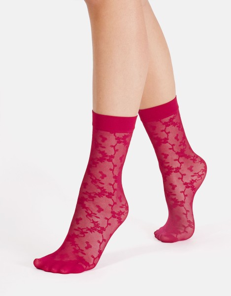 Cette - Calcetines transparentes con estampado floral